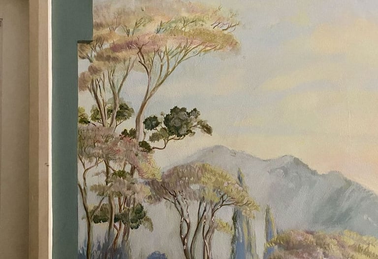 Detail of mural with painted architectural detail around a door frame, by House of Lyria