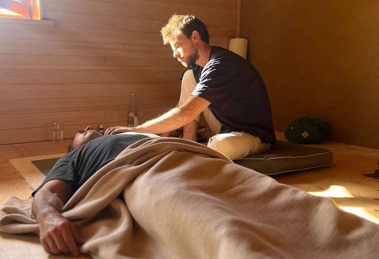 A person guiding a breathwork session 