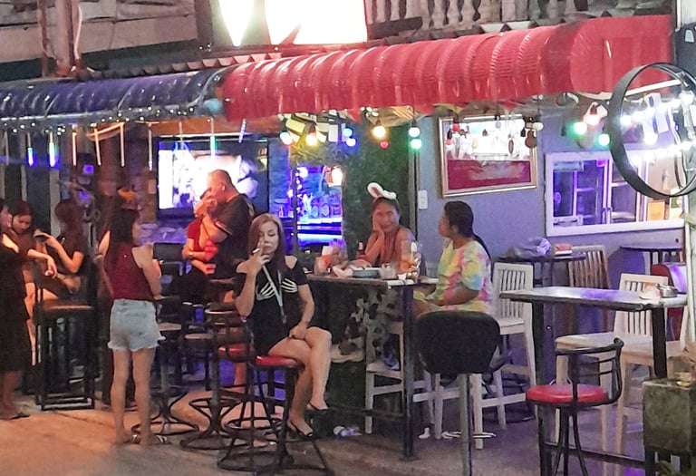 Thai women outside bars at Soi 80, Hua Hin in Thailand
