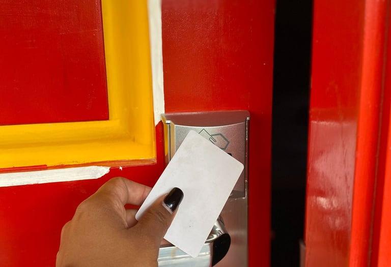 a person holding a card and a card in their hand