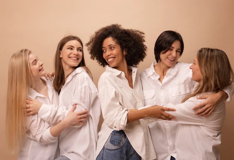 a group of women who are all wearing white shirts
