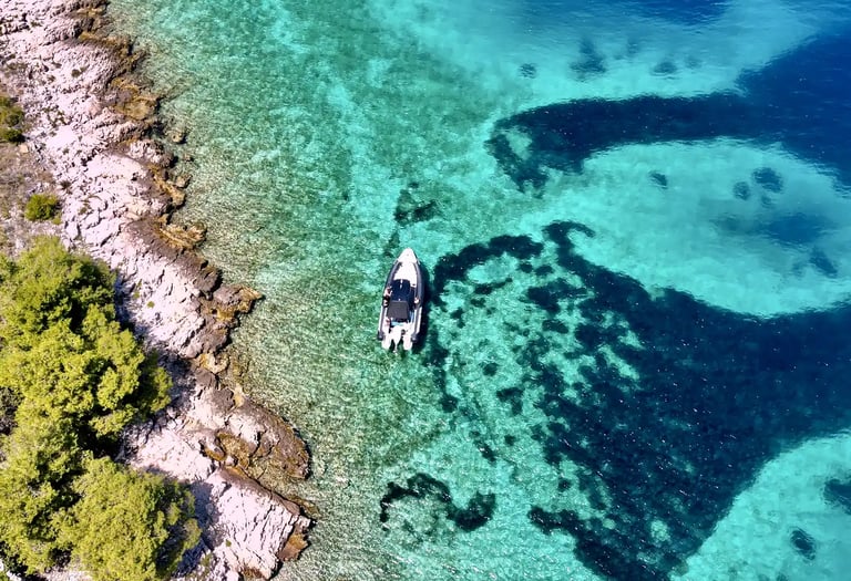 Aerial panoramic view of Drvenik Mali Island, seen on a private boat tour off the coast of Split, Croatia.