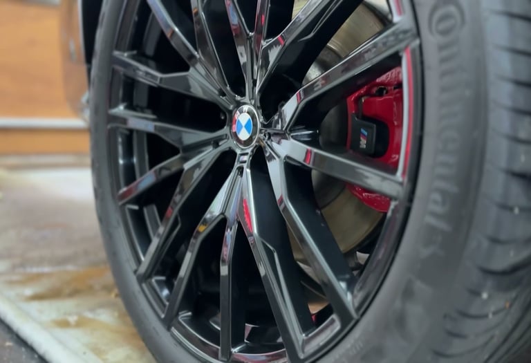 ceramic coated rim on black bmw