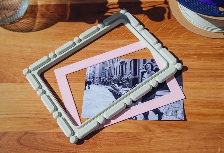 3D printed photo frame with image and visible color options for customization
