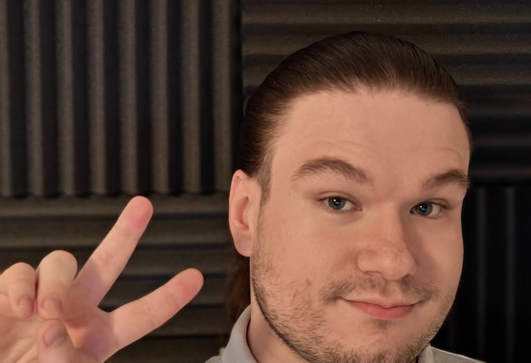 a man with a beard and a white shirt