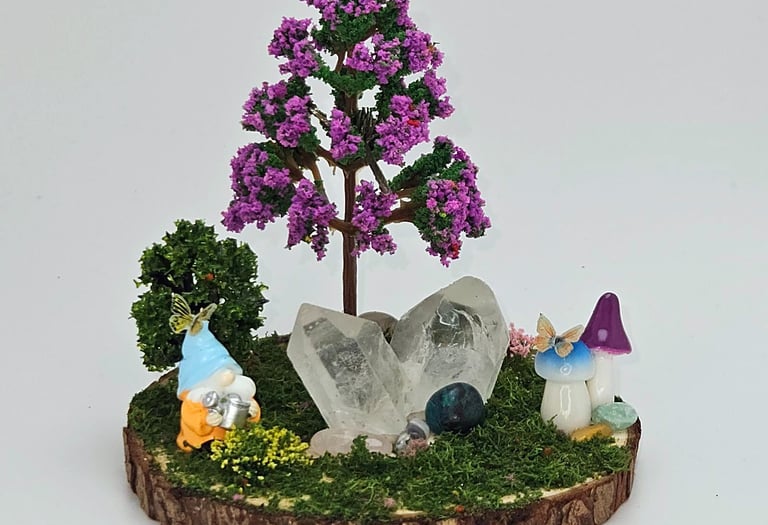 A decoration, a small circle of wood made to look like a gnome in a fairy forest with quartz crystal