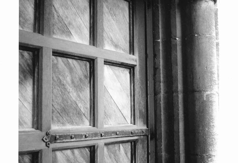 Wooden entrance door to the historical building, Architecture photography. Creator: Slawek Dejneka