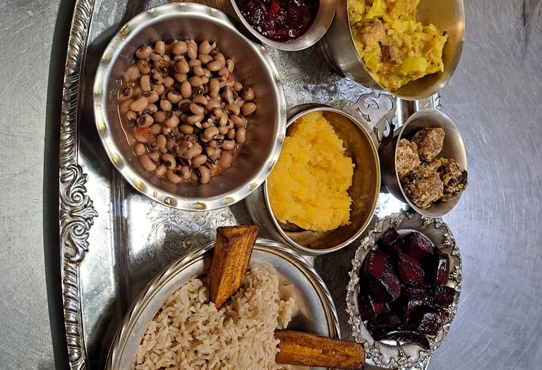 Hare Krishna Prasadam offering tray with vegetarian food in each section