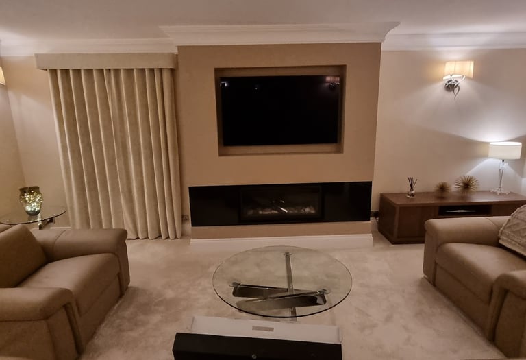 Bespoke media wall with 4K TV and electric fire in Milton Keynes.