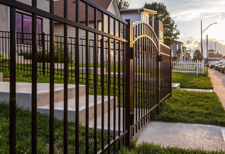 Sleek aluminum fencing with a modern look, offering low maintenance and durable protection