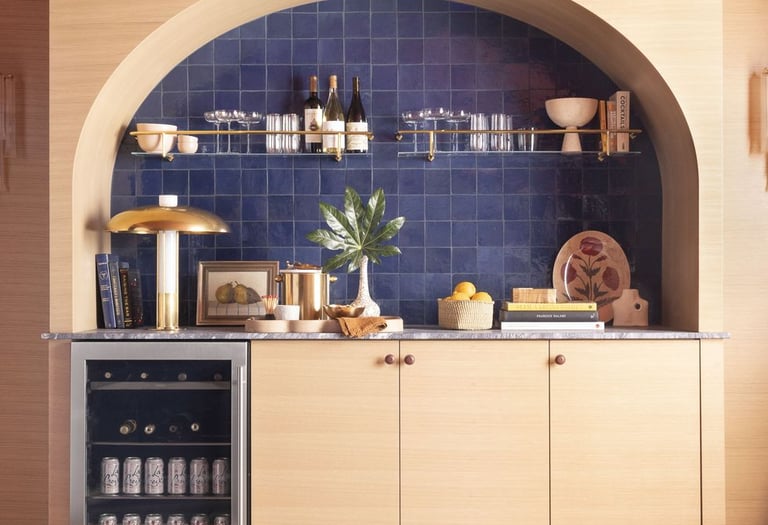 a kitchen with a blue tile floor and a red tile floor
