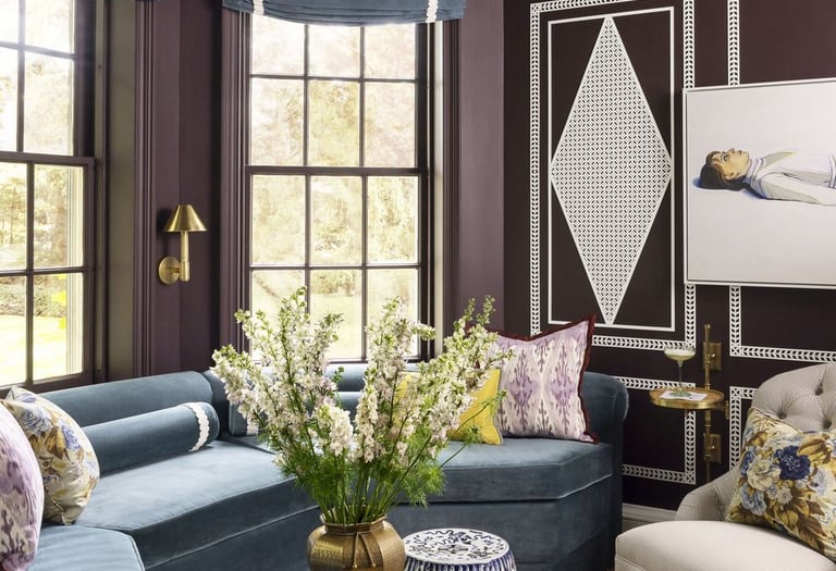 a living room with a couch and a chair