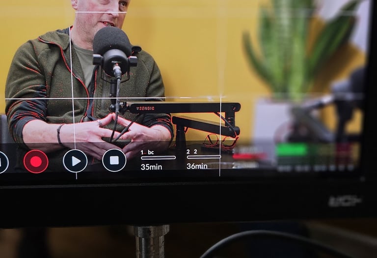 Shot of podcast guest through video monitor