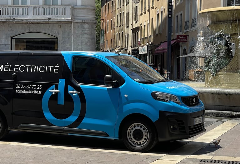 a van with electric charging station on the side of the road