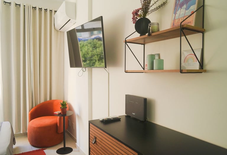 a television screen with a television and a chair