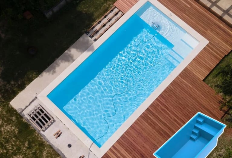 a pool with a wooden deck and a pool