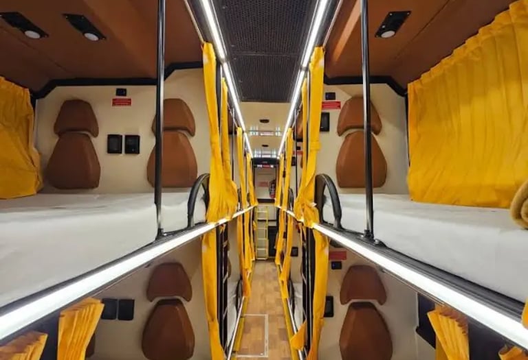 sleeper bus interior designed for night travel in Delhi NCR