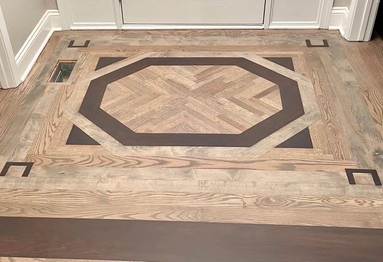 Custom hardwood floor entryway design