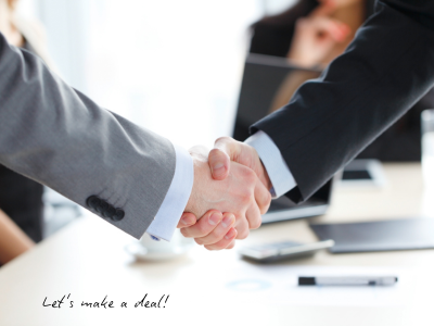 two hands shaking, to close a deal