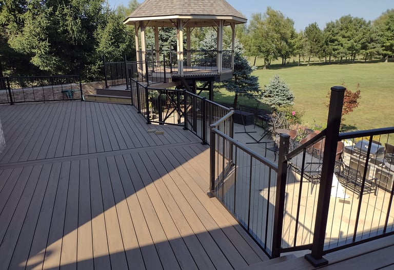 Outdoor composite deck by professional deck builder in [Columbus, Ohio]