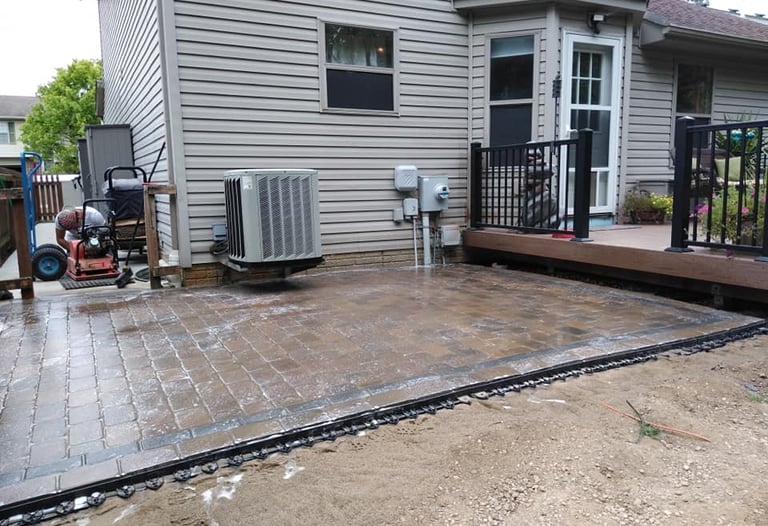 Custom paver patio installation in Columbus Ohio backyard