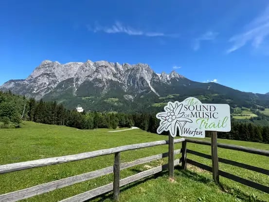 The official Sound of Music Trail sign in the mountains of Werfen.