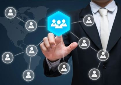 a person in a suit and tie with a blue hexagon of a CBI affiliate network