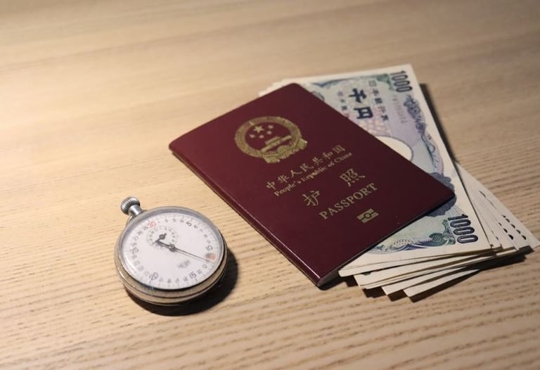 a passport and money on a table