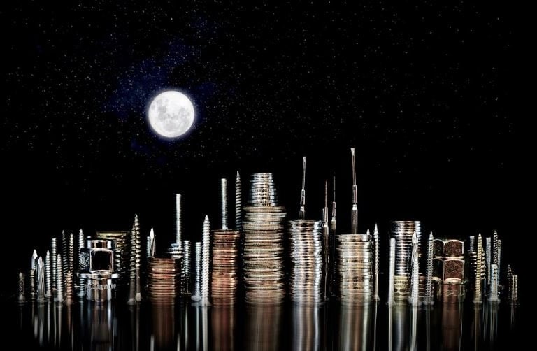 a night cityscape made of money and metal