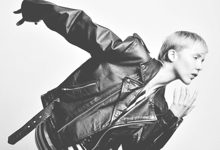 a woman in a leather jacket