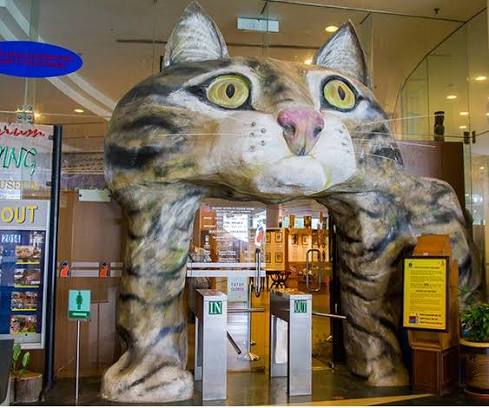 Giant cat face archway entrance to the Kuching Cat Museum in Sarawak, Malaysia.