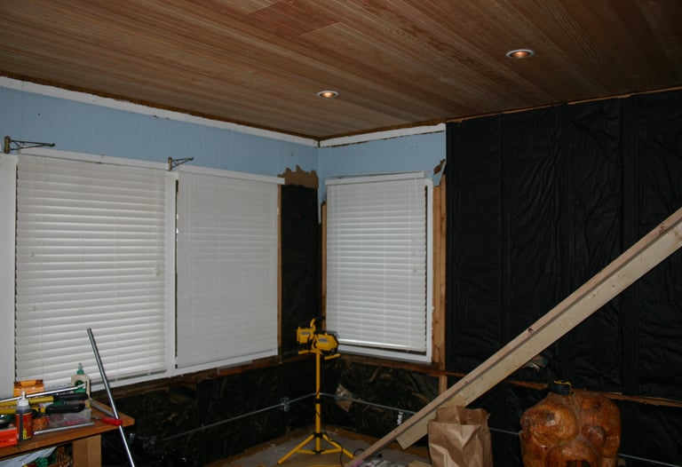 Stripped down to studs, added ceiling lights and insulation. Maybe 2009