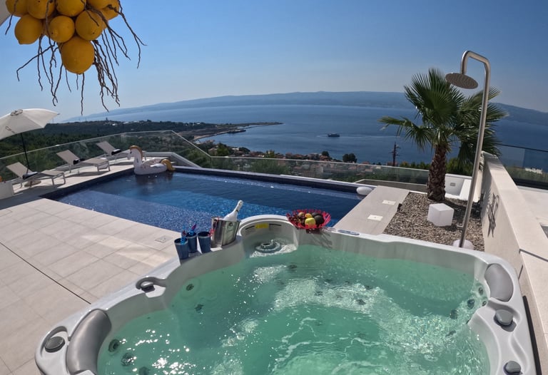 Villa Fay hot tub at pool deck with a view of the ocean