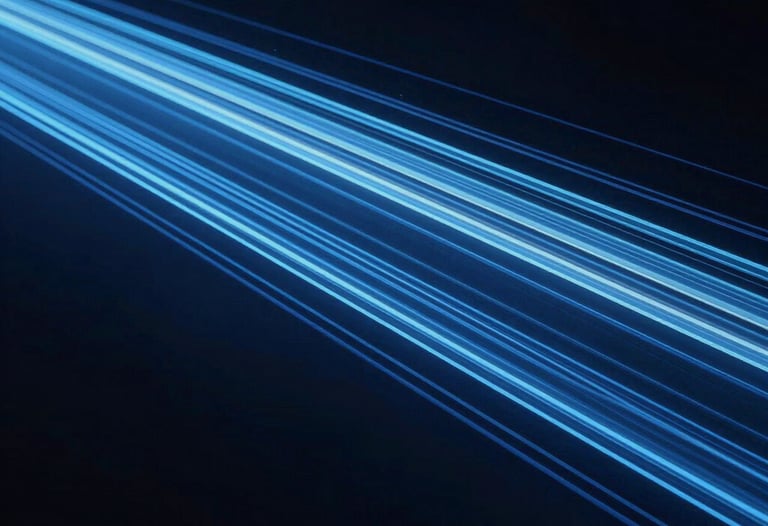 An abstract photograph representing data flow, with light trails in navy blue and light blue moving through a dark space, symbolizing high-impact analysis.