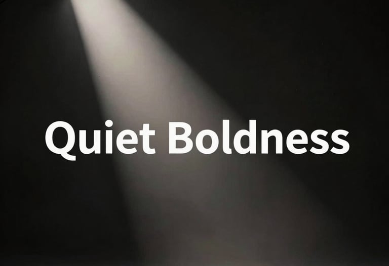 A cinematic high-contrast photograph of a light beam cutting through a dark studio, highlighting the concept of 'Quiet Boldness'.