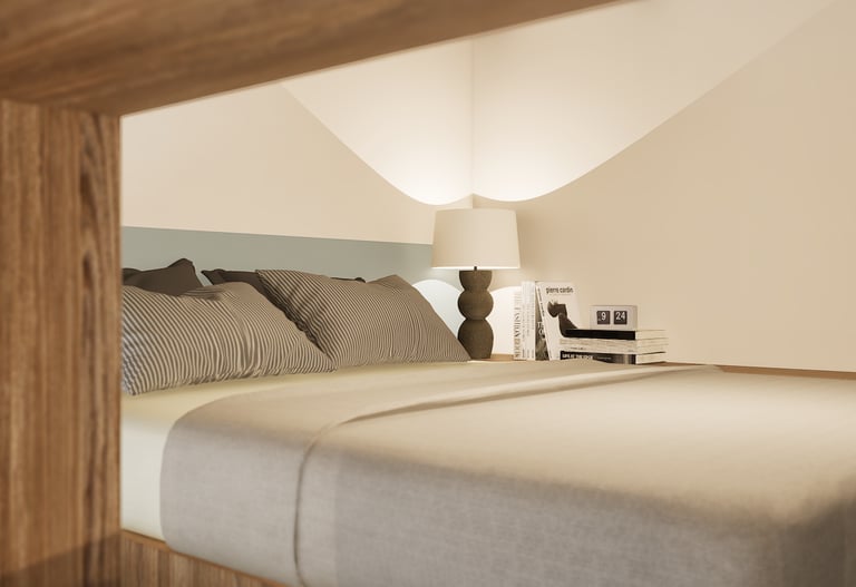 Chambre sur la mezzanine, vue zoomer sur la tête de lit et la lampe de chevet
