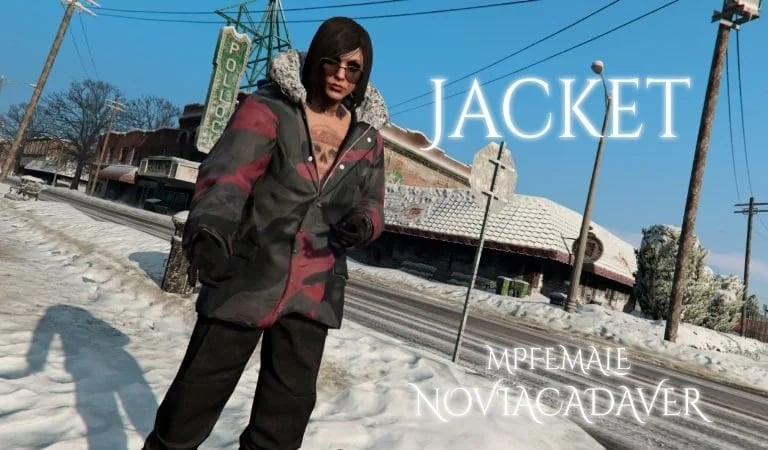 a man in a jacket and sunglasses standing in the snow