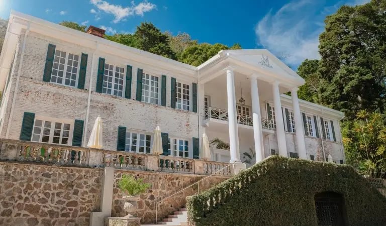 Luxury white colonial mansion, the New Cadejo Brewing in Santa Tecla