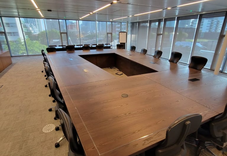22ft x 14ft custom white ash conference table built for ETFO — corner