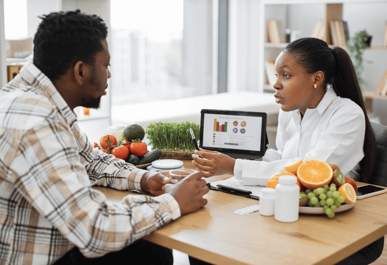 two people looking at the results of a nutrients test.