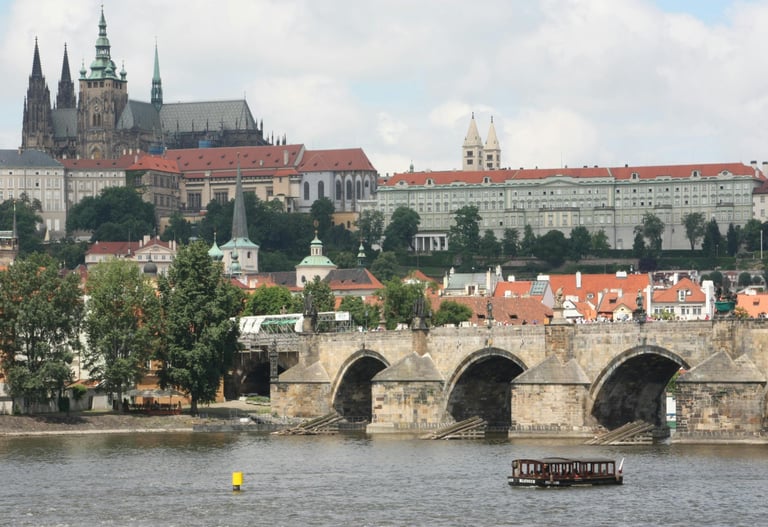 Prague city skyline with Charles Bridge and historic castle