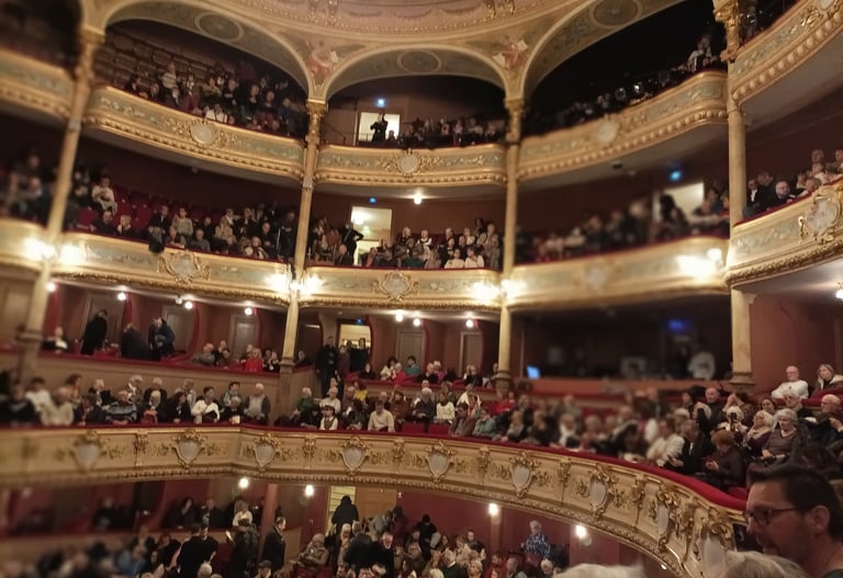 The audience gathers