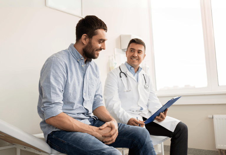 a man in a doctor's office for a primary care visit