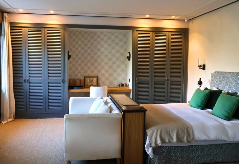Bedroom at Villa La Gratitud with Hamptons-style wardrobes