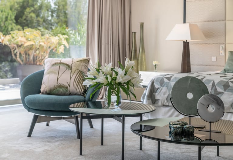 Contemporary designer suite at Villa Serenity, featuring clean lines and a soft, neutral palette