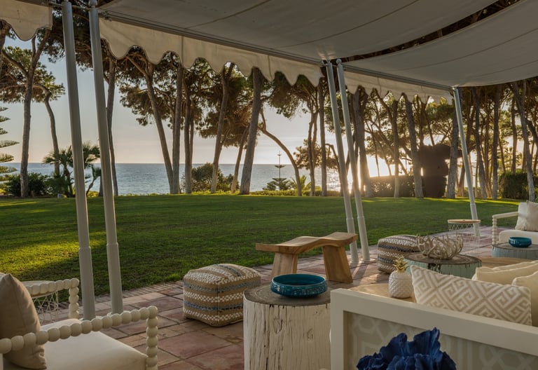 Sunset views over the sea and lush gardens from Villa El Rincon 