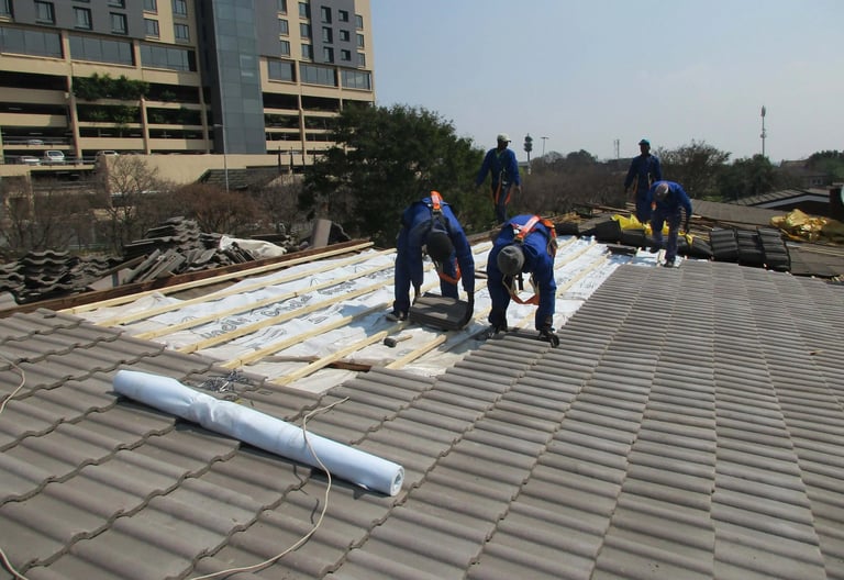 Laying roof tiles for roof installation Project, Environmental Pro Construction