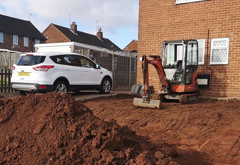 Mini digger in use for drainage and groundwork in Oldbury and Smethwick