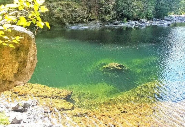 Yacolt, WA - An emerald pool along Lewis River past the Moulton Falls Bridge