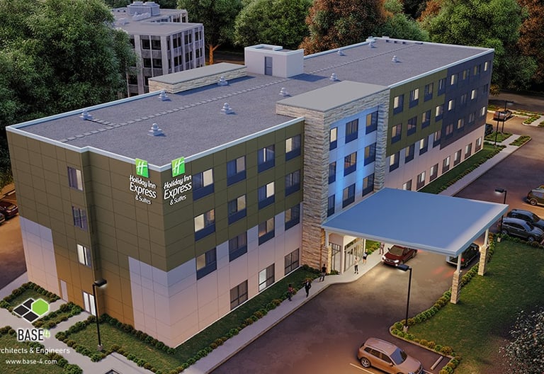 a hotel with a large building and a parking lot